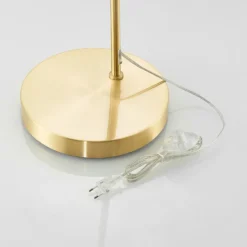 Lámpara arqueada Lennart de Lindby, latón, altura regulable, E27