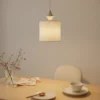 Lámpara colgante Amura, beige/arena, tela, Ø 25 cm, E27
