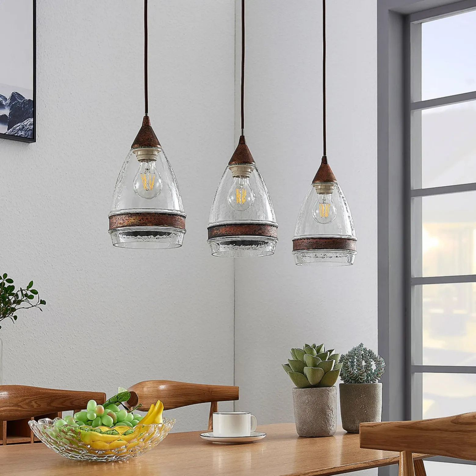 Lámpara colgante de cristal Lindby Millina, 70 cm, marrón óxido, 3 luces.