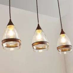 Lámpara colgante de cristal Lindby Millina, 70 cm, marrón óxido, 3 luces.