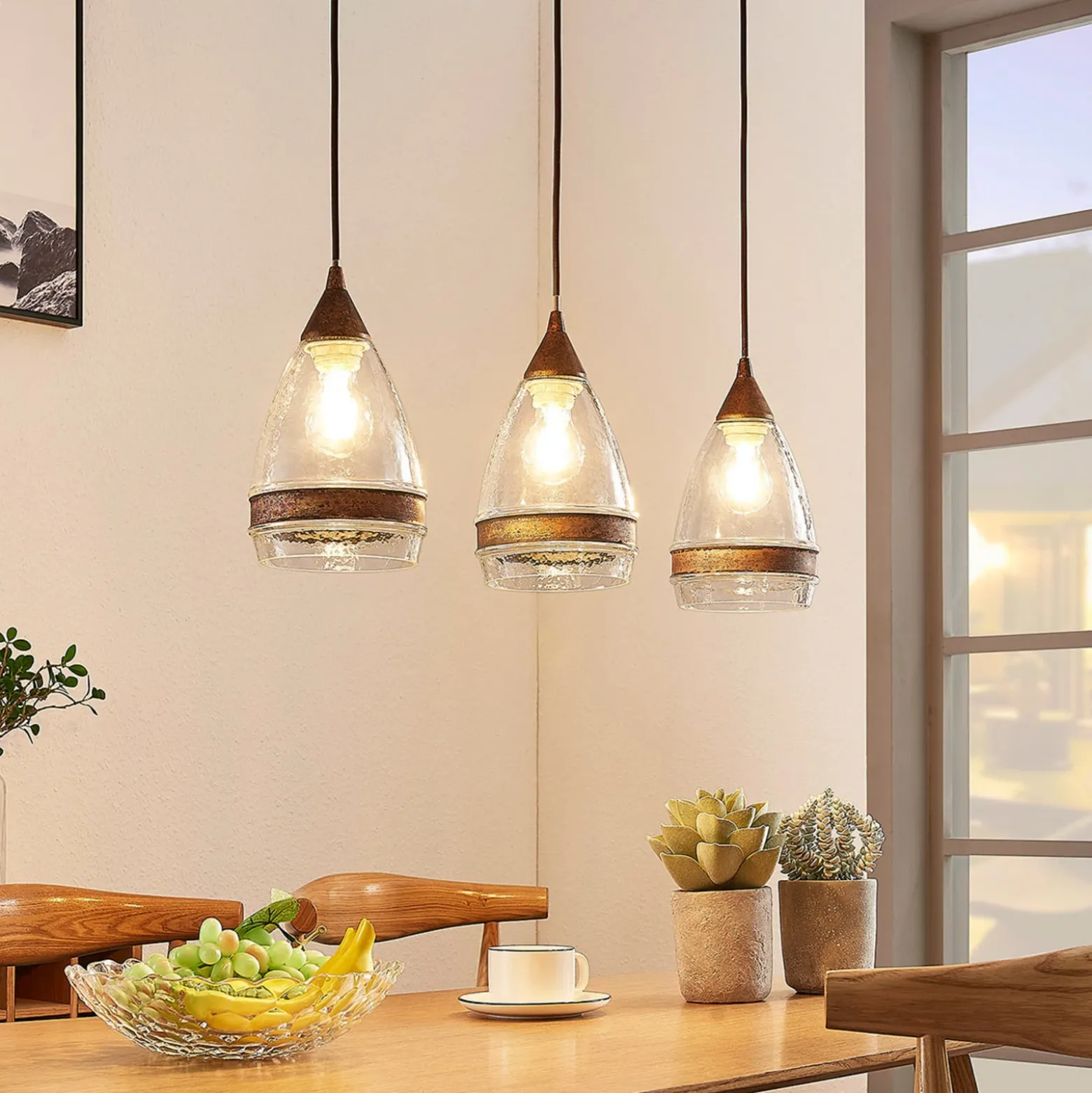 Lámpara colgante de cristal Lindby Millina, 70 cm, marrón óxido, 3 luces.
