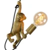 Lámpara colgante Extravaganza Chimp, dorado mate/negro