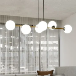 Lámpara colgante Gravity, blanco opalino/dorado/negro, cristal, E14
