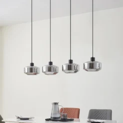 Lámpara colgante Hildur de Lindby, 4 luces, 115 cm, gris humo, cristal