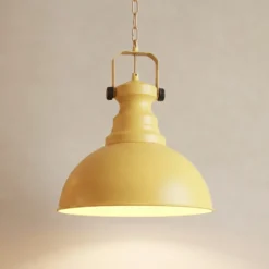 Lámpara colgante Kure, amarilla, Ø 31 cm, metal, E27