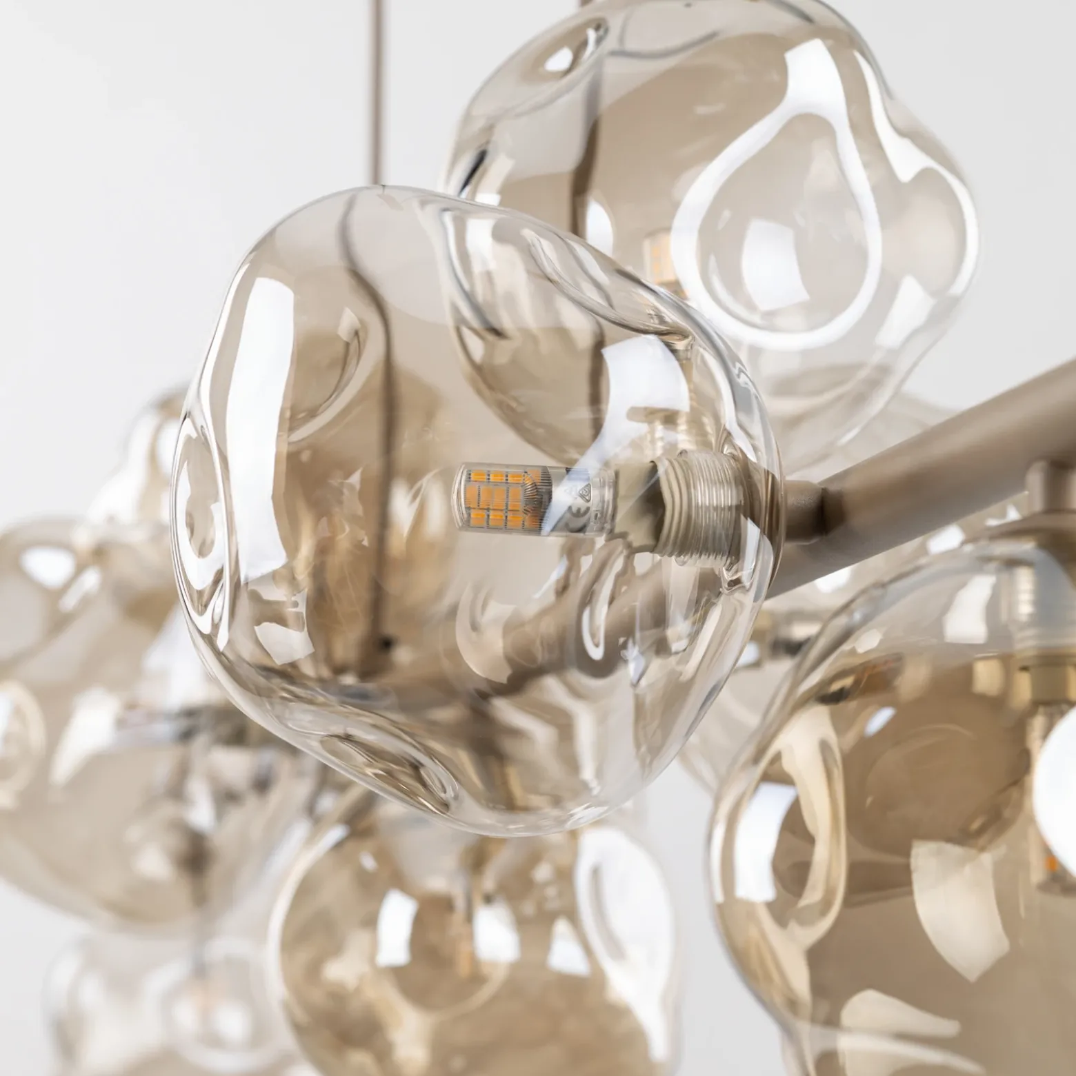 Lámpara colgante Lava, beige, 9 luces, cristal, longitud 116 cm, G9