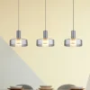 Lámpara colgante LED Grant, longitud 90 cm, gris humo, 3 luces, cristal