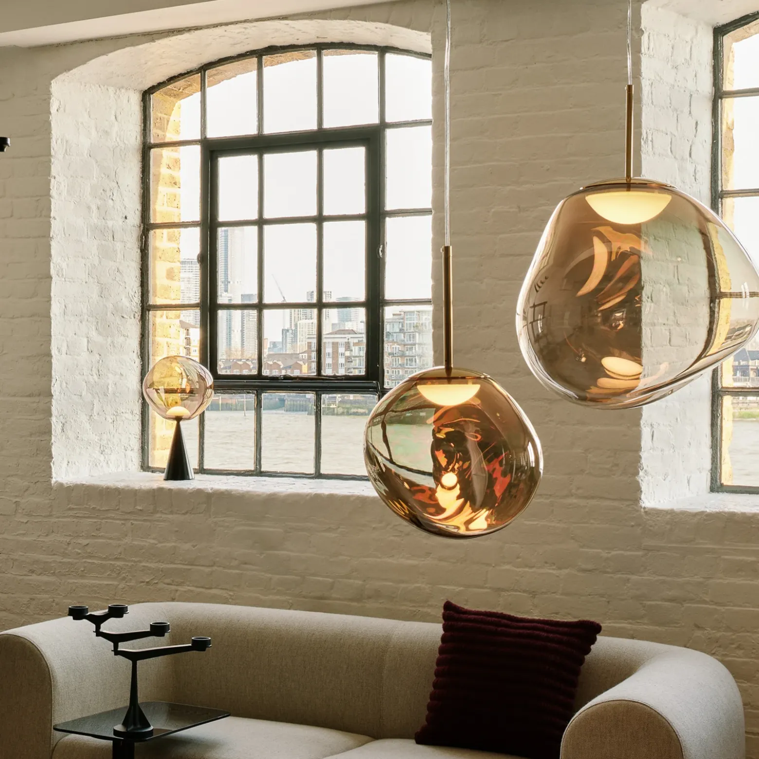 Lámpara colgante LED Melt de Tom Dixon, Ø 28 cm, color bronce