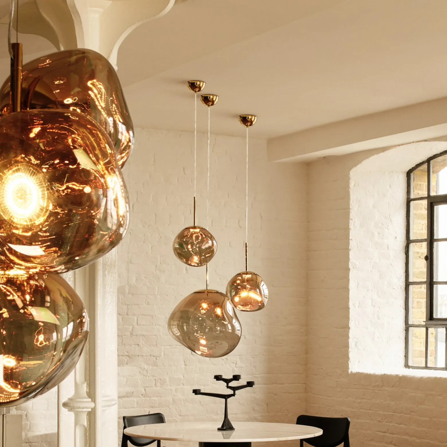 Lámpara colgante LED Melt de Tom Dixon, Ø 28 cm, color bronce