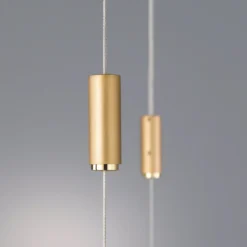 Lámpara colgante LED Quitani Tolu, longitud 179 cm, latón