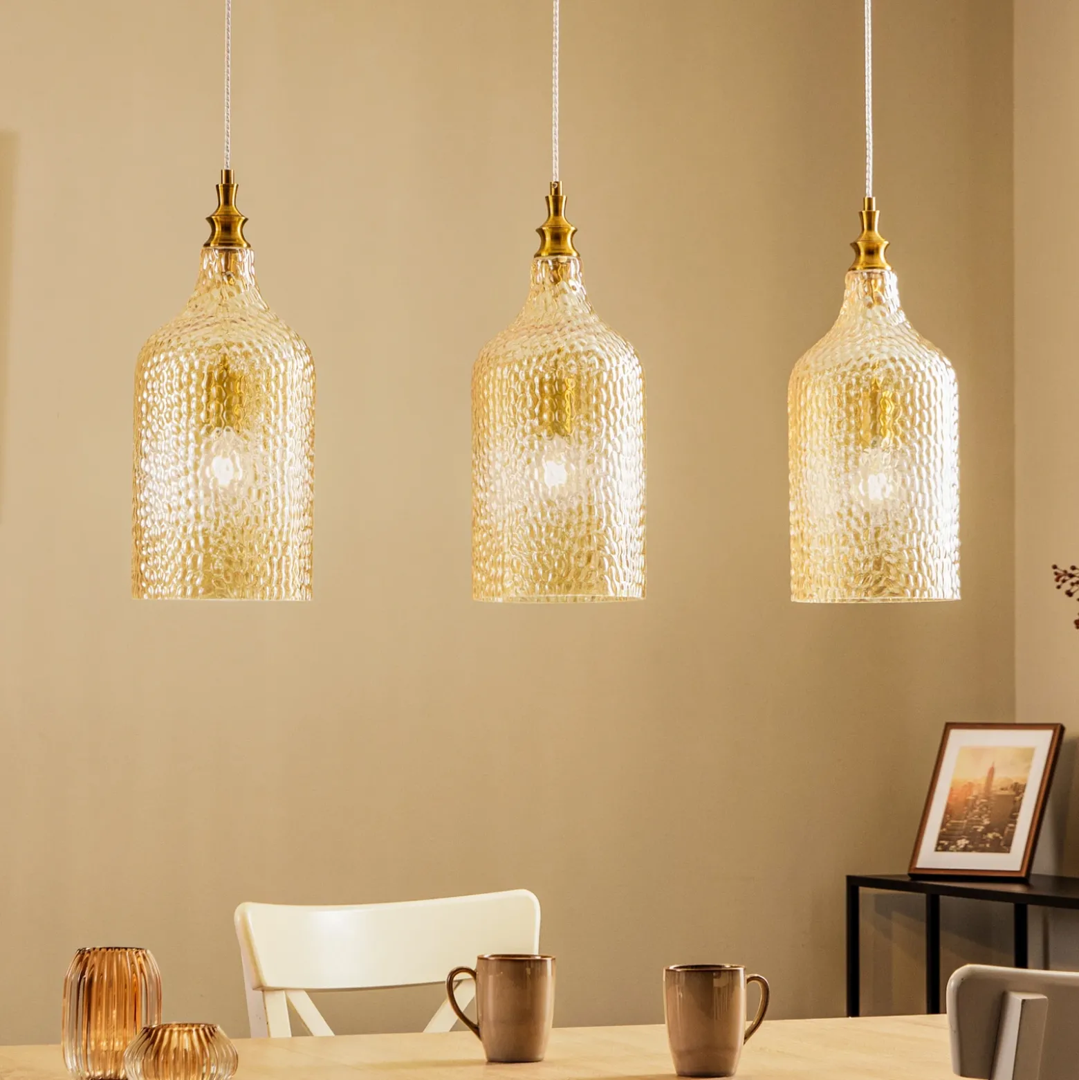 Lámpara colgante Lindby Drakar, 3 luces, ámbar, cristal, Ø 19,5 cm