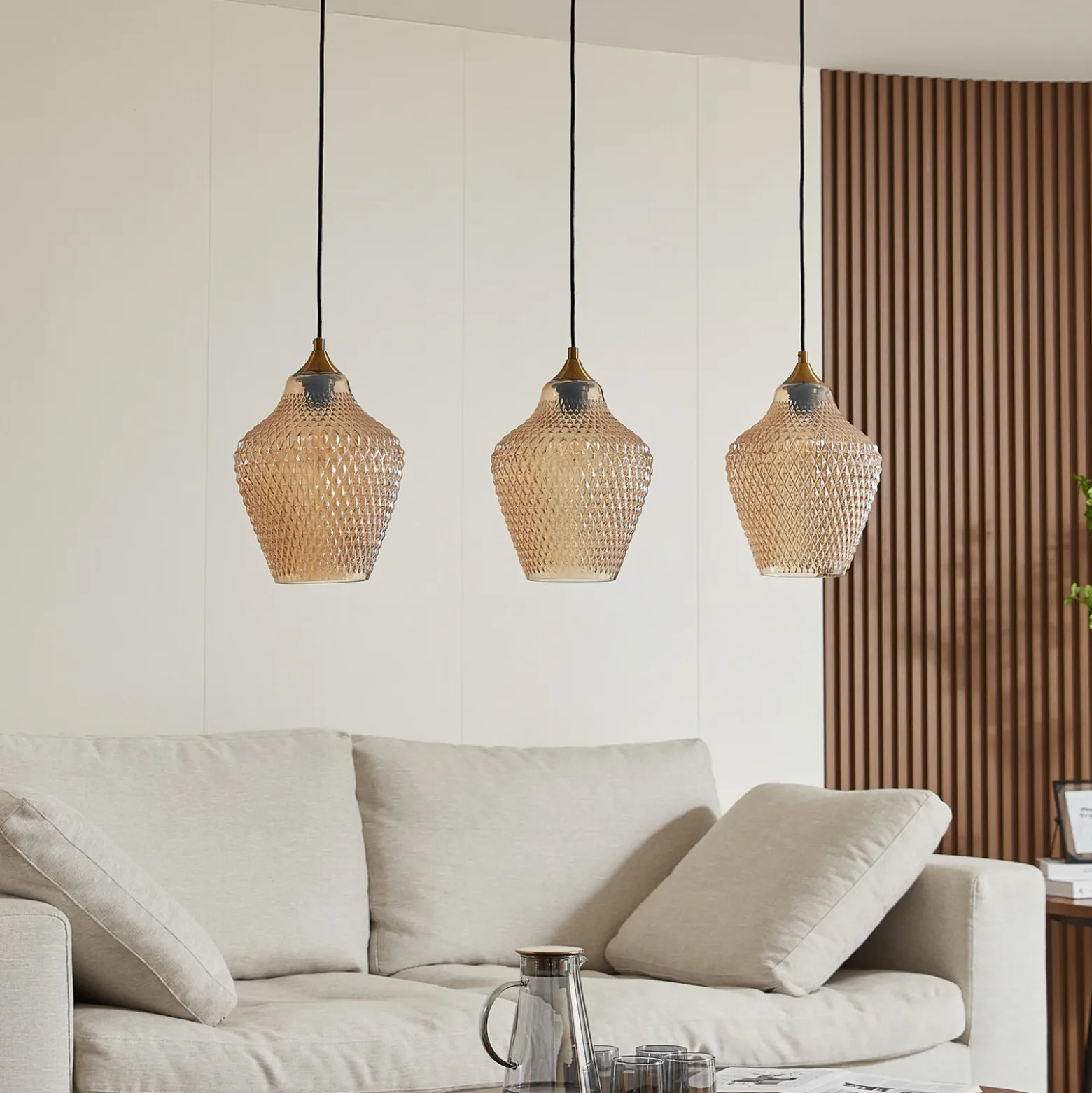 Lámpara colgante Lindby Drakar, Ø 22 cm, 3 luces, ámbar, cristal