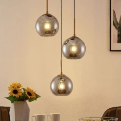 Lámpara colgante Lindby Jurian, 32 cm, 3 luces, bronce, humo, cristal