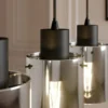 Lámpara colgante Lindby Kourtney, 4 luces, negro/gris, cristal, E27