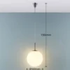 Lámpara colgante Lindby Marike, Ø 30 cm, blanca, cristal, globo, E27