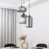 Lámpara colgante Lindby Marla, redonda, cristal, gris humo, 50 cm