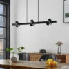 Lámpara colgante Lindby Savoli, 116 cm, negra, 6 luces, acero
