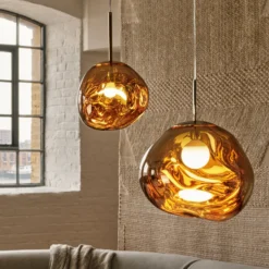 Lámpara colgante Melt de Tom Dixon, Ø 28 cm, color bronce, portalámparas