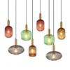 Lámpara colgante Normy, longitud 125 cm, colorida, cristal, 8 luces.