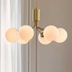 Lámpara colgante Nuura Apiales 6, Ø 50 cm, color latón/ópalo