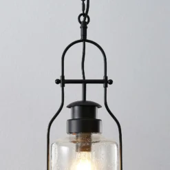 Lámpara colgante Rozalie de Lindby, negra, metal, farol, 21 cm