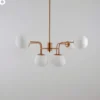 Lámpara de araña Erich de Maytoni, latón rosado, vidrio/metal, 8 luces.
