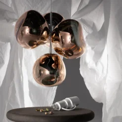 Lámpara de araña LED Melt Chandelier de Tom Dixon, color cobre