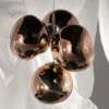 Lámpara de araña LED Melt Chandelier de Tom Dixon, color cobre