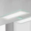 Lámpara de espejo LED Nikita aguamarina/gris acero