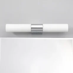 Lámpara de espejo Ziva de Lindby, enchufe, blanco, cristal, IP44