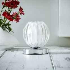 Lámpara de mesa Claw, función táctil, transparente