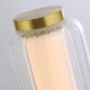 Lámpara de mesa LED Mod, color latón, atenuable en 3 niveles, acero