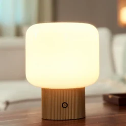 lámpara de mesa LED recargable Lucande Katrin Palme, beige, cristal