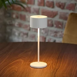 Lámpara de mesa LED recargable Veluna, blanca, altura 25 cm, IP44, atenuable,