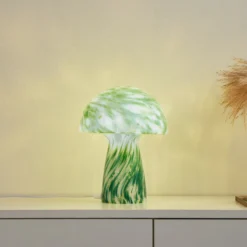 Lámpara de mesa Lindby Hubi, verde, cristal, Ø 22 cm, forma de seta