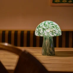 Lámpara de mesa Lindby Hubi, verde, cristal, Ø 22 cm, forma de seta