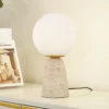 Lámpara de mesa Lindby Kirstan, beige, blanco, cristal, piedra, 33 cm