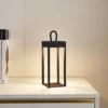 Lámpara de mesa Lindby LED recargable Iruna, negra, metal, 27cm, atenuable.