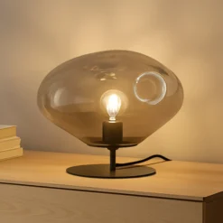 Lámpara de mesa Lindby Lelia, gris humo, cristal, metal, Ø 35 cm
