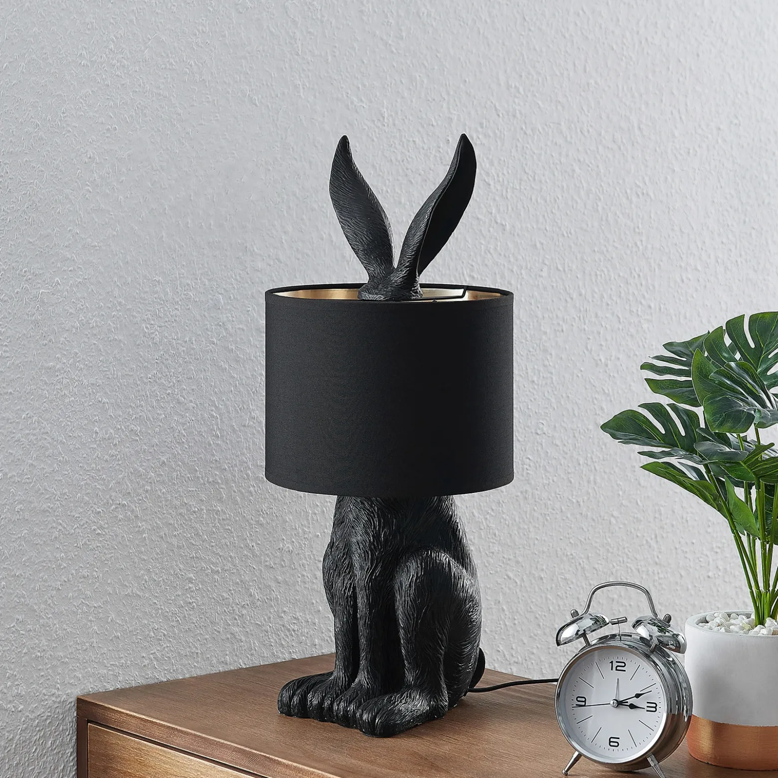 Lámpara de mesa Lindby Lorentina, 56 cm, conejo, negro, textil