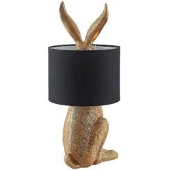 Lámpara de mesa Lindby Lorentina, altura 57 cm, conejo, dorada, textil