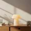 Lámpara de mesa Lindby Magali, blanca, papel, Ø 34 cm, E14