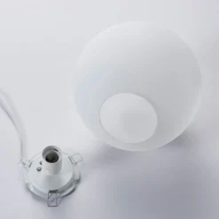 Lámpara de mesa Lindby Marike, blanca, cristal, globo, Ø 25 cm, E27