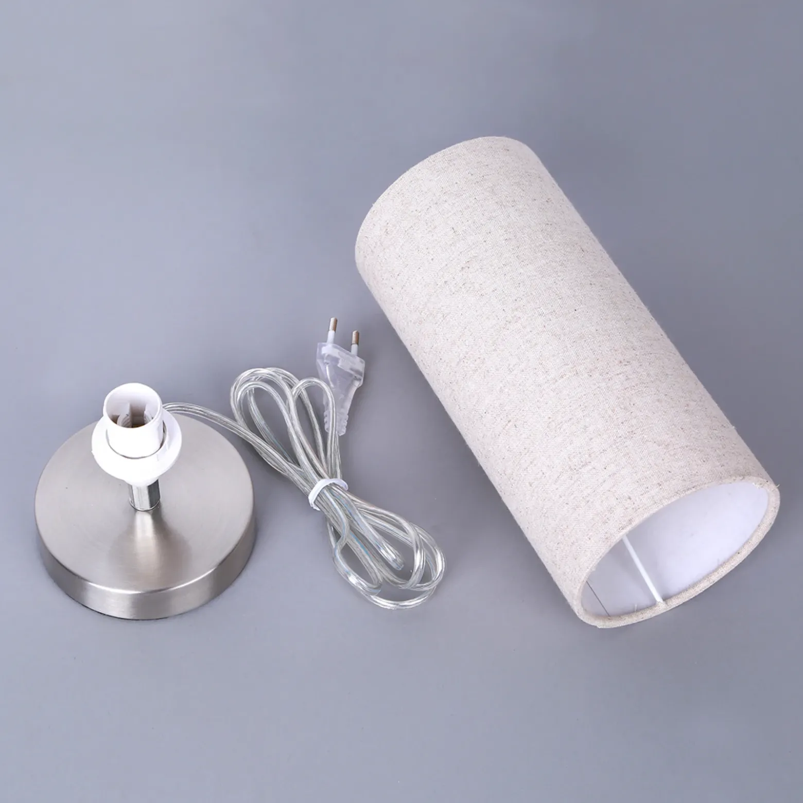 Lámpara de mesa Lindby Ronja, altura 26 cm, color crema, textil
