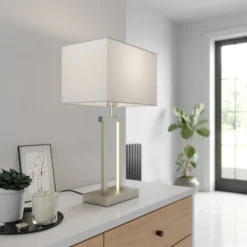 Lámpara de mesa Lindby Sigurd, blanca, tela, altura 54cm, E27