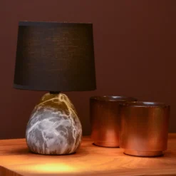 Lámpara de mesa Marmo con pie de cerámica, negro