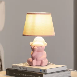 Lámpara de mesa Monkey, rosa, cerámica, 28 cm de altura, E14