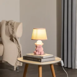 Lámpara de mesa Monkey, rosa, cerámica, 28 cm de altura, E14