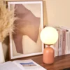 Lámpara de mesa Pauleen Glowing Charm, base de cerámica oxidada
