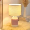 Lámpara de mesa Pauleen Sandy Glow, crema/rosa